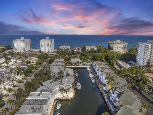 aerial view featuring a water view and a city view