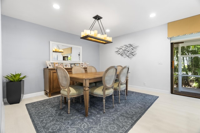 dining room featuring recessed lighting, light wood-style floors, and baseboards