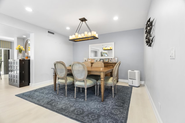 dining space featuring recessed lighting, visible vents, baseboards, and wood finished floors