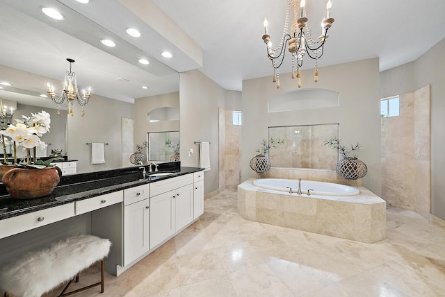 full bath featuring vanity, a bath, recessed lighting, walk in shower, and a notable chandelier