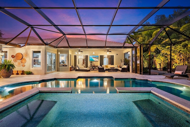 view of pool with a patio area, an outdoor hangout area, a pool with connected hot tub, and ceiling fan