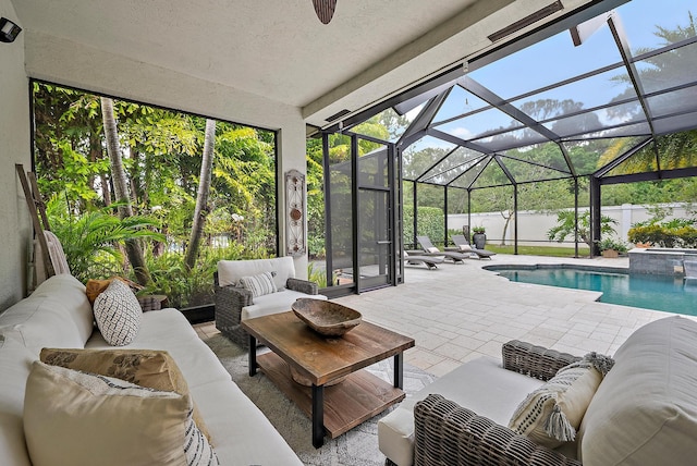 exterior space with an outdoor living space, a fenced backyard, and a pool with connected hot tub