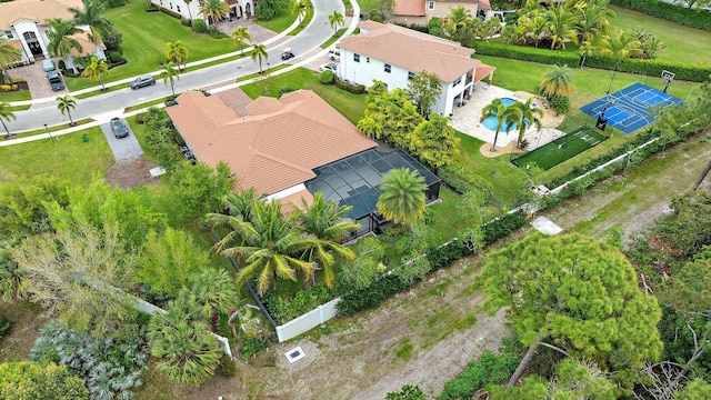 birds eye view of property with a residential view