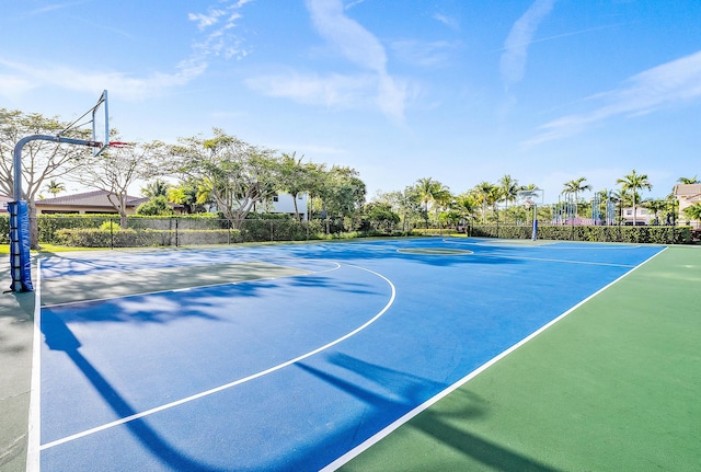 view of sport court featuring community basketball court and fence