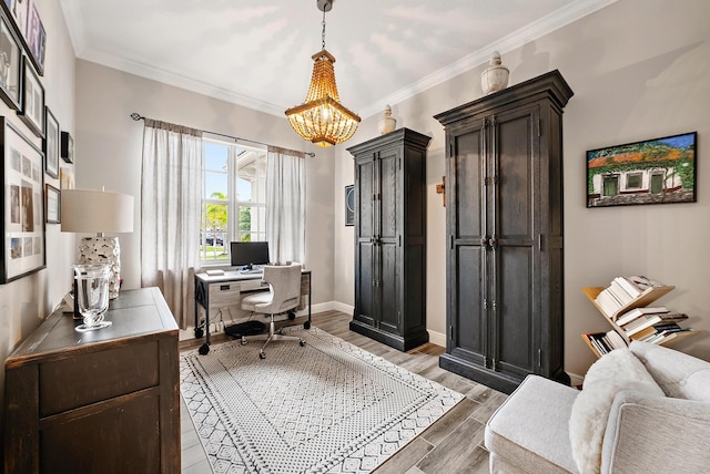 home office featuring light wood-type flooring, baseboards, ornamental molding, and a chandelier