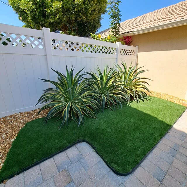 view of yard featuring fence