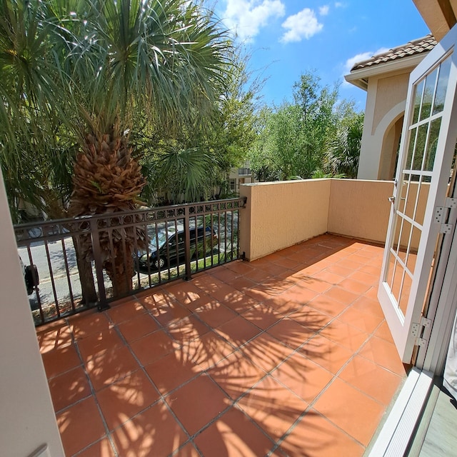 view of patio / terrace with a balcony