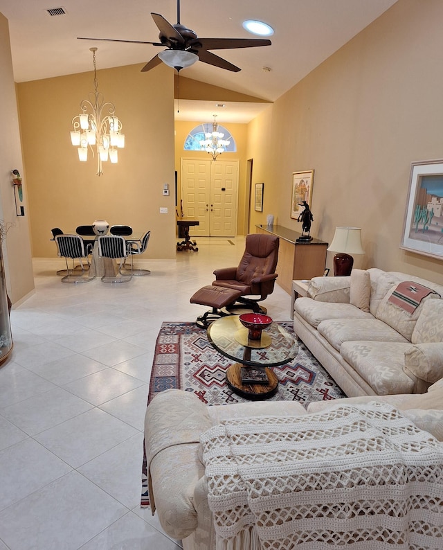 tiled living area featuring recessed lighting, visible vents, high vaulted ceiling, and ceiling fan with notable chandelier