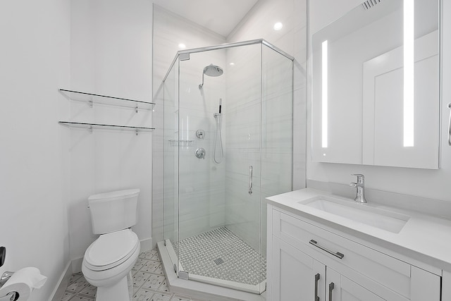 bathroom with visible vents, a shower stall, baseboards, toilet, and vanity