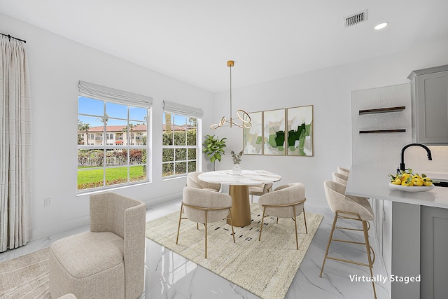 dining space with recessed lighting, visible vents, marble finish floor, and baseboards