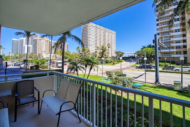 balcony featuring a city view