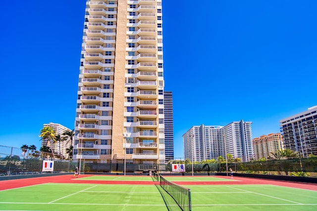 view of sport court with community basketball court and fence