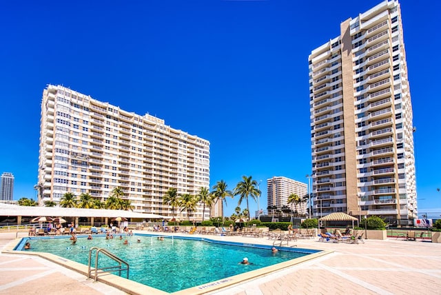 pool featuring a patio area