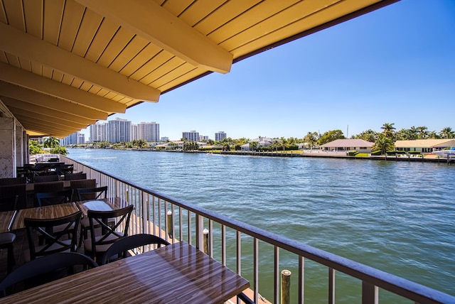 balcony featuring a water view