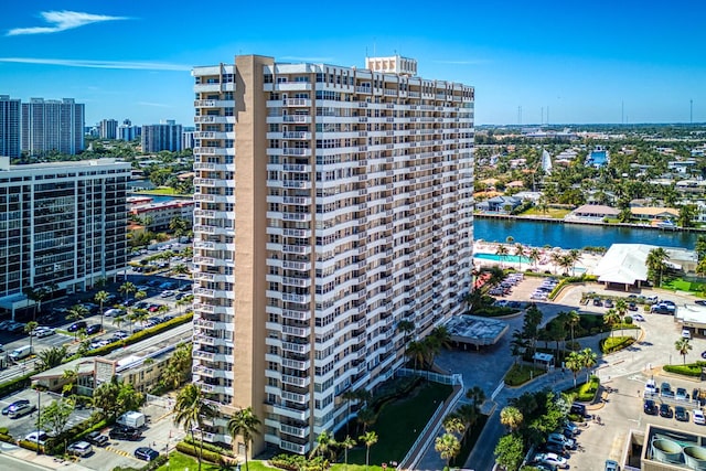 drone / aerial view with a water view and a view of city