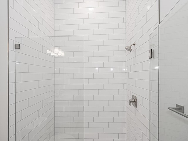 full bathroom with a shower stall