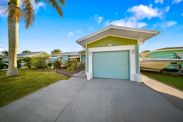 garage with concrete driveway