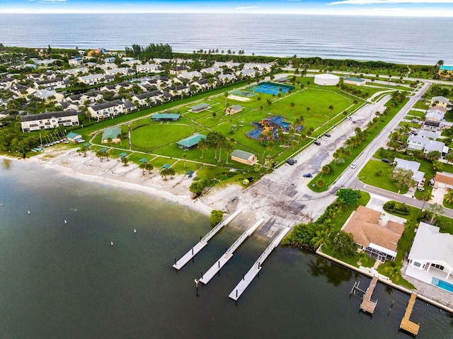 aerial view featuring a residential view and a water view