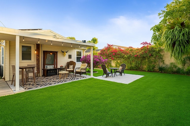 832 Lytle St, West Palm Beach, FL 33405 - view of green lawn with a patio and outdoor lounge area