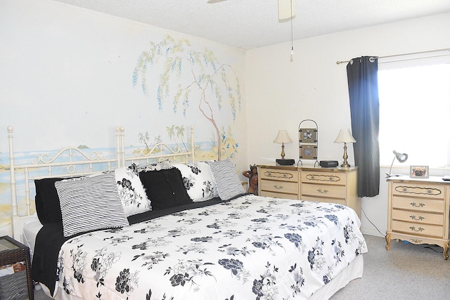 bedroom with light colored carpet and a textured ceiling