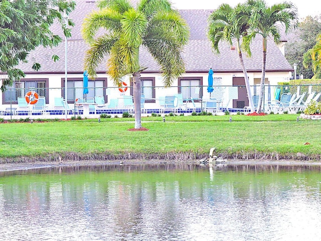 water view featuring fence