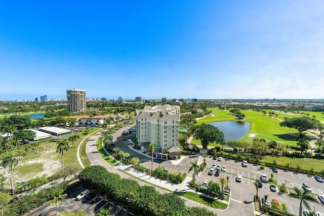 bird's eye view featuring a water view and a city view