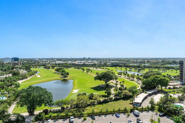 bird's eye view featuring a water view and view of golf course