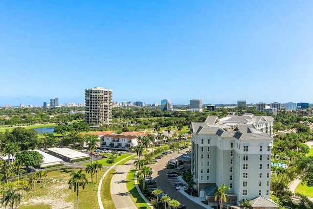 aerial view featuring a water view and a city view