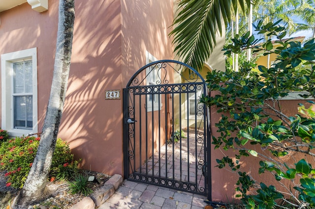 view of gate featuring fence