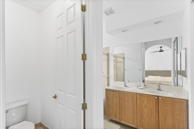 full bath featuring a shower stall, toilet, visible vents, and a sink