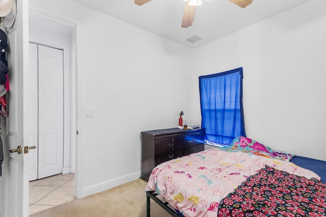 bedroom with visible vents, carpet floors, baseboards, and ceiling fan