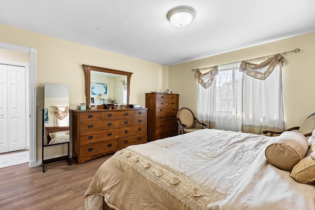 bedroom featuring wood finished floors