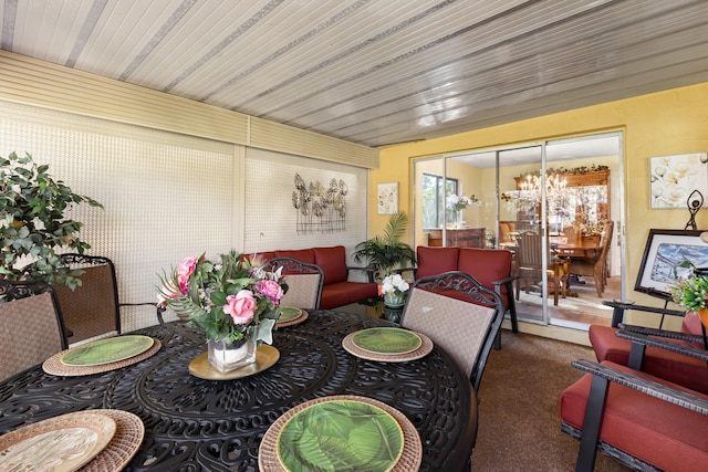 dining room featuring carpet