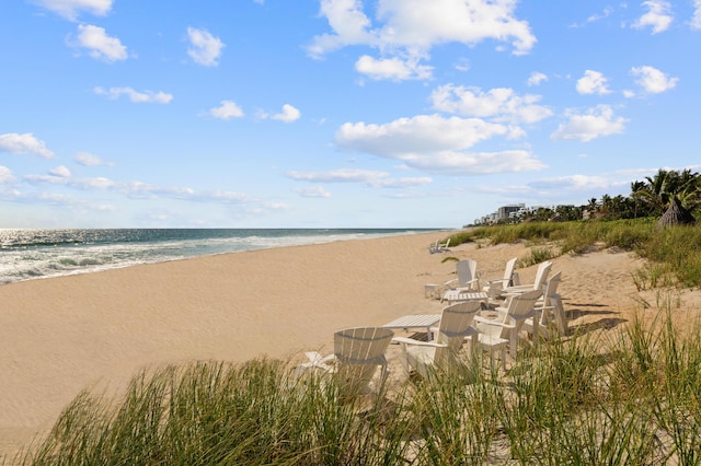 view of water feature with a beach view