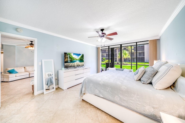 bedroom featuring a textured ceiling, light tile patterned flooring, baseboards, and ornamental molding