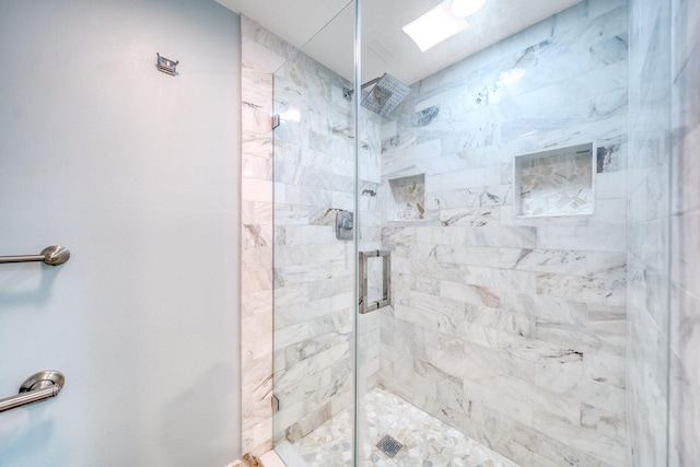 bathroom featuring a stall shower