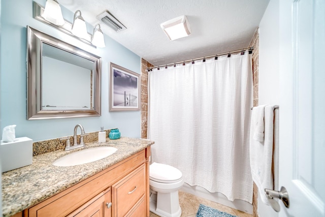 full bathroom featuring vanity, visible vents, tile patterned flooring, a textured ceiling, and toilet