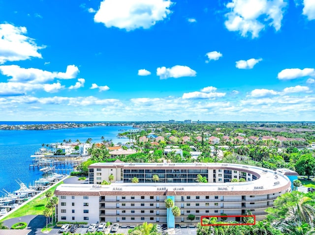 birds eye view of property featuring a water view