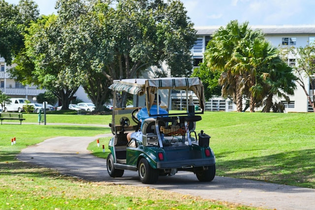 surrounding community featuring a yard and playground community