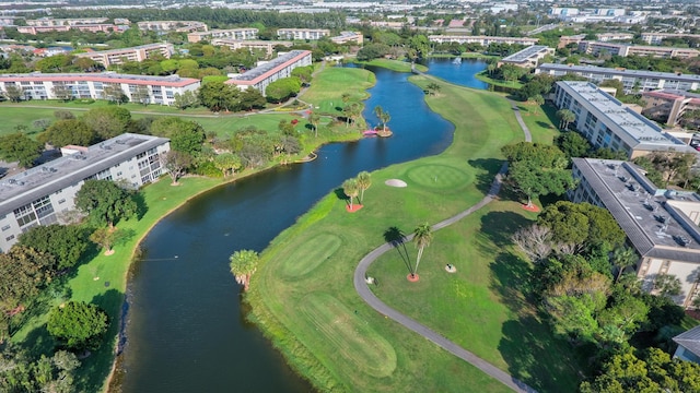 aerial view with view of golf course and a water view