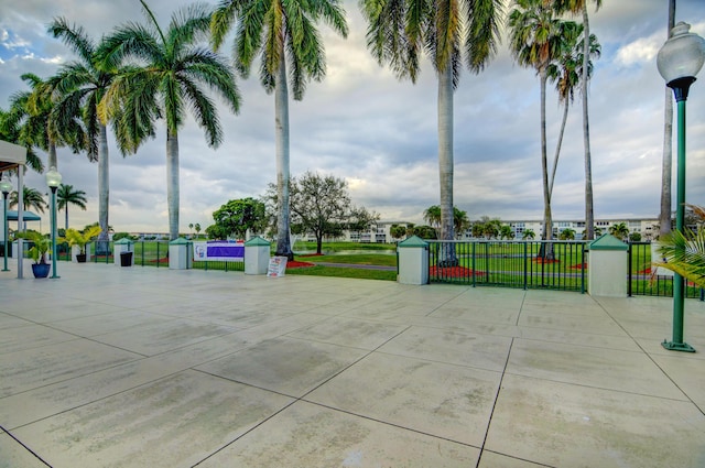 view of community featuring fence