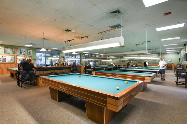 recreation room with visible vents, a paneled ceiling, carpet, and billiards