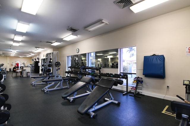 gym with visible vents and baseboards