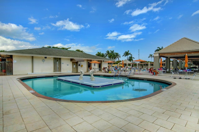 pool featuring a patio area