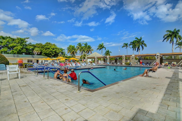 pool featuring a patio area