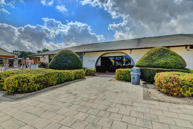 exterior space with stucco siding