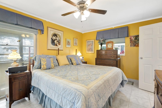 bedroom featuring light tile patterned flooring, crown molding, and a ceiling fan