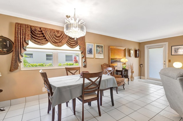 dining space with light tile patterned floors, a chandelier, and crown molding