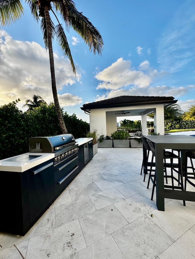 view of patio with exterior kitchen