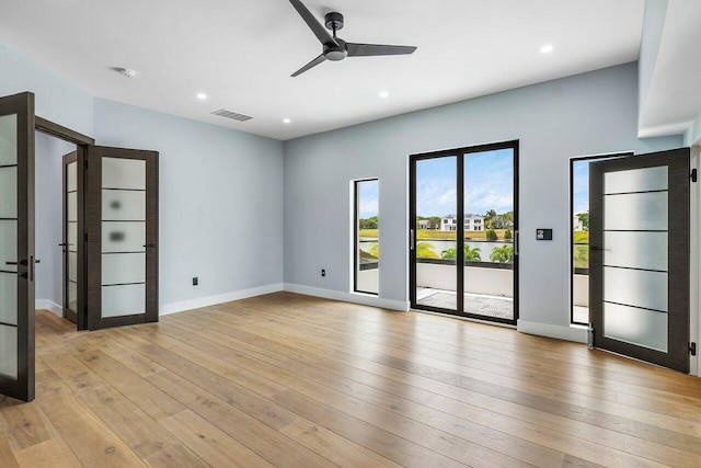 8387 Sawpine Rd, Delray Beach, FL 33446 - empty room featuring ceiling fan, light wood finished floors, recessed lighting, baseboards, and a smoke detector